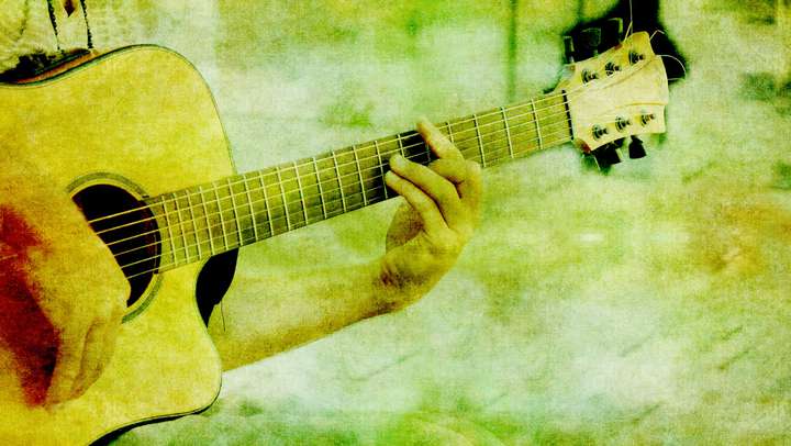 Bild zeigt eine Gitarre.